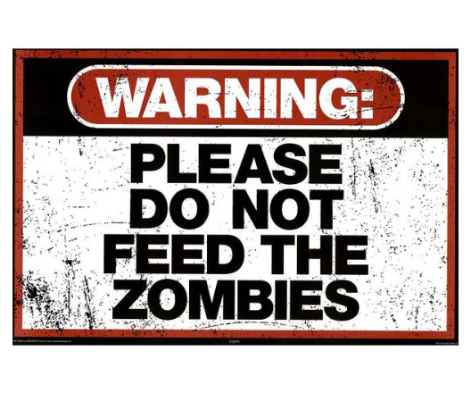 FUNNY A5 LAMINATED SIGN  WARNING DO NOT FEED THE ZOMBIES 